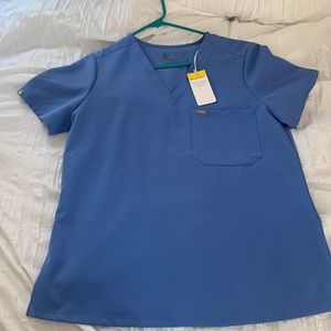Figs Catarina one pocket scrub top. Ceil blue.